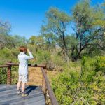 Tourist-looking-at-panorama-with-binocular-from-viewpoint-over-the-Olifants-river-820x520